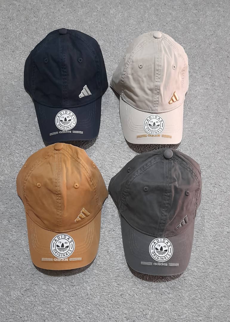 a couple of cell phones sitting on the ground 