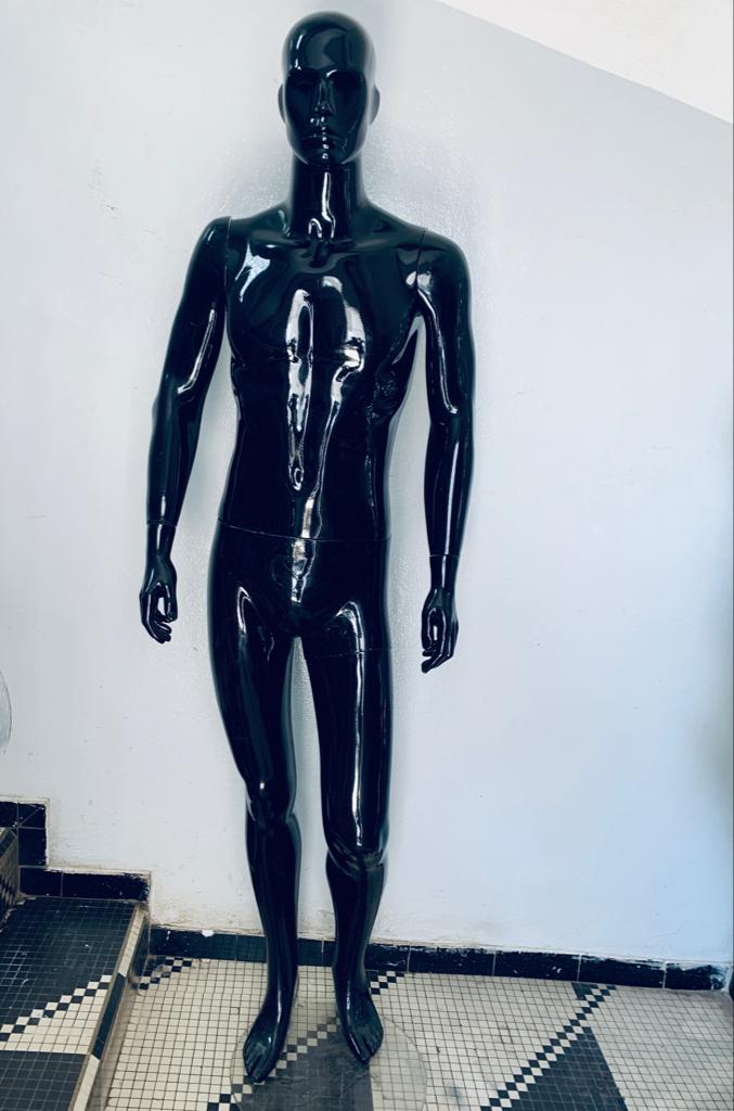 a couple of men standing next to each other 