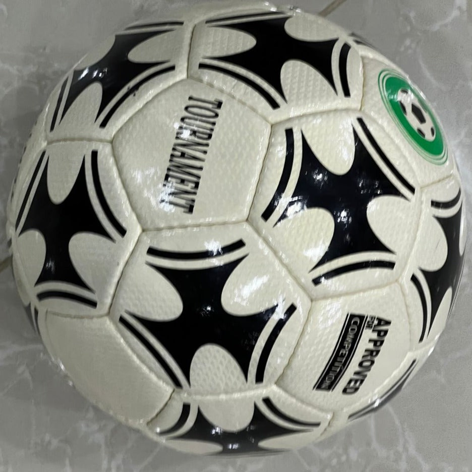 a black and white photo of a soccer ball 