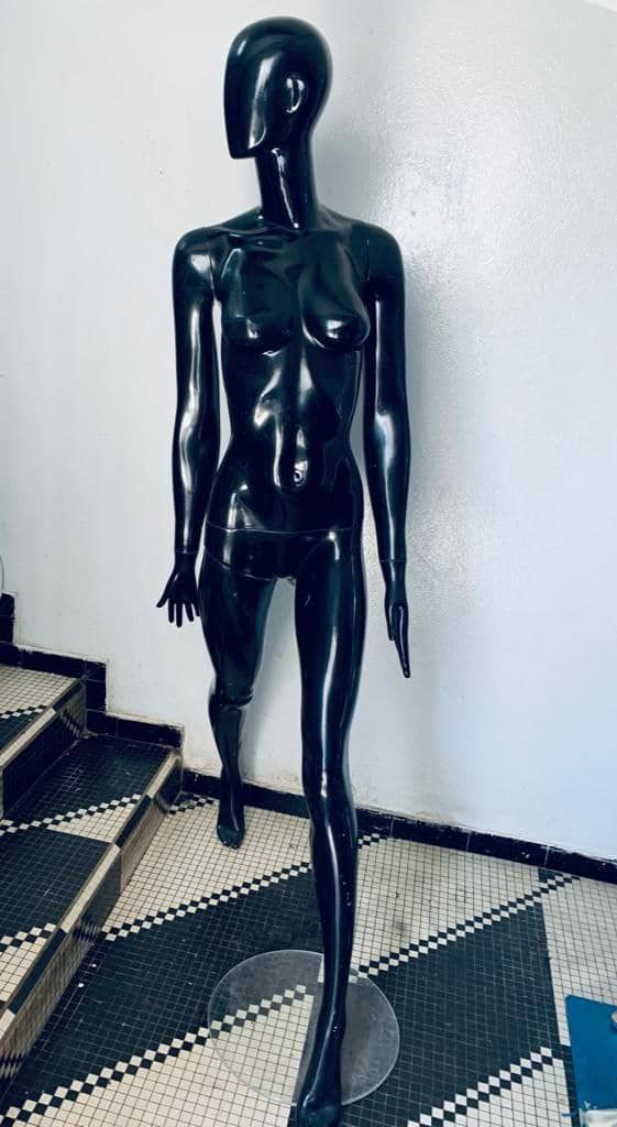 a couple of men standing next to each other 