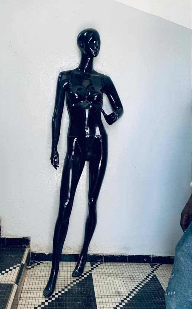 a couple of people standing on top of a bridge 