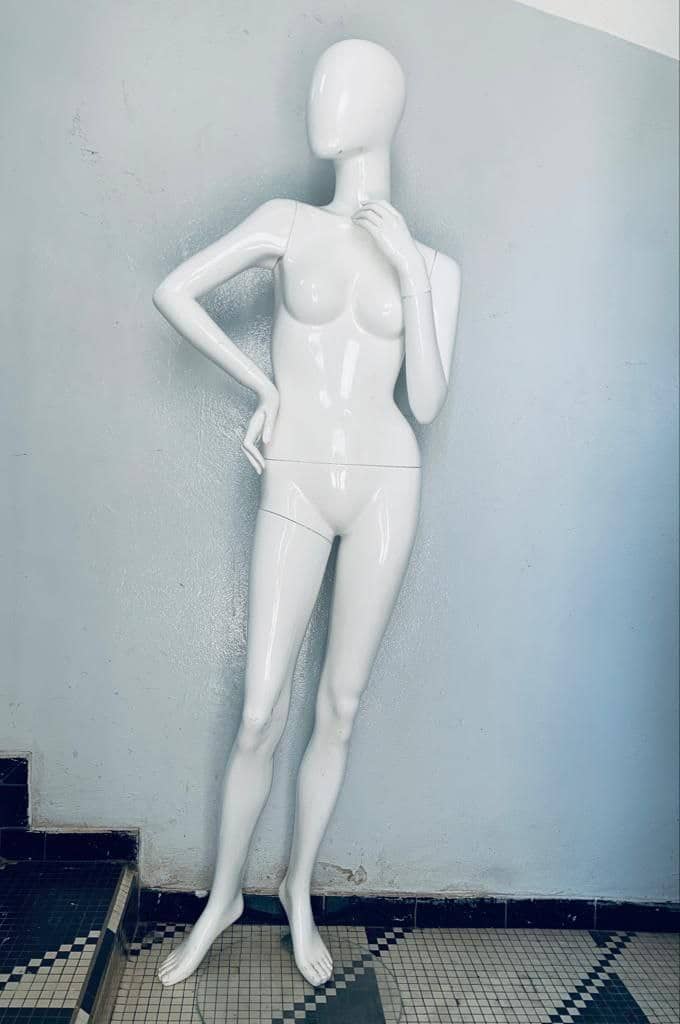 a black and white photo of a tennis player 