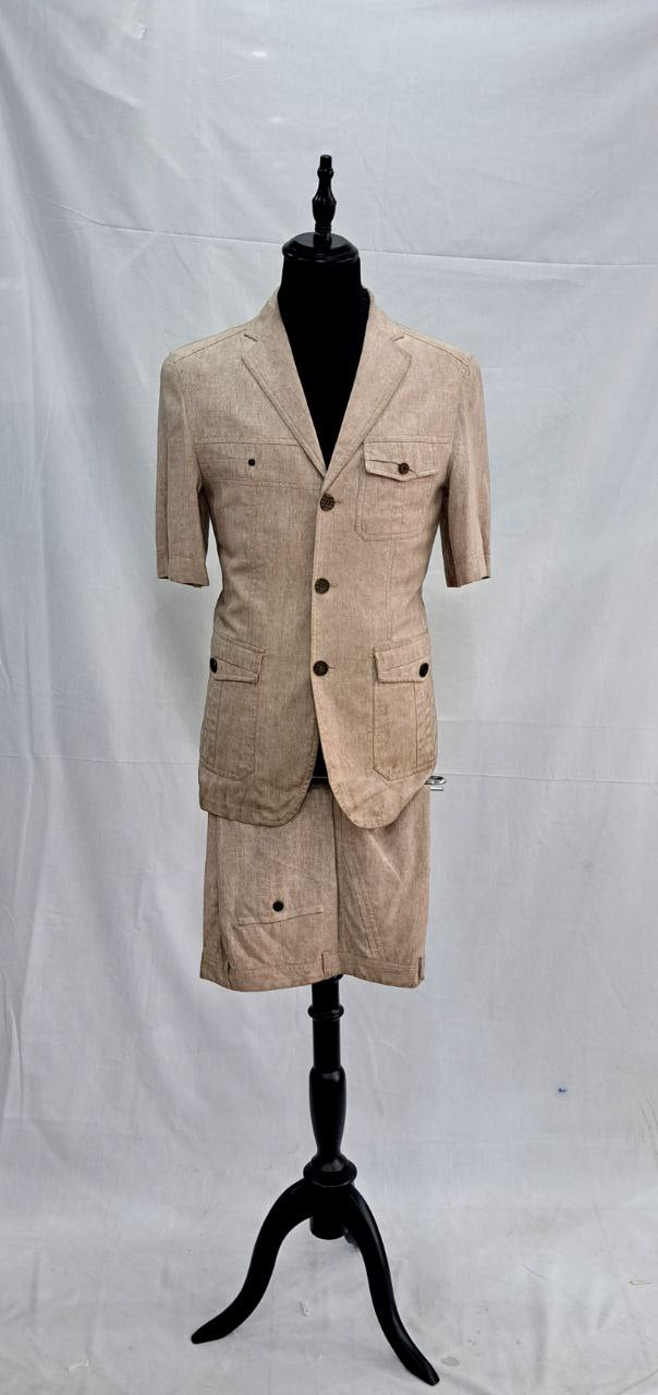 a couple of people walking on a beach 