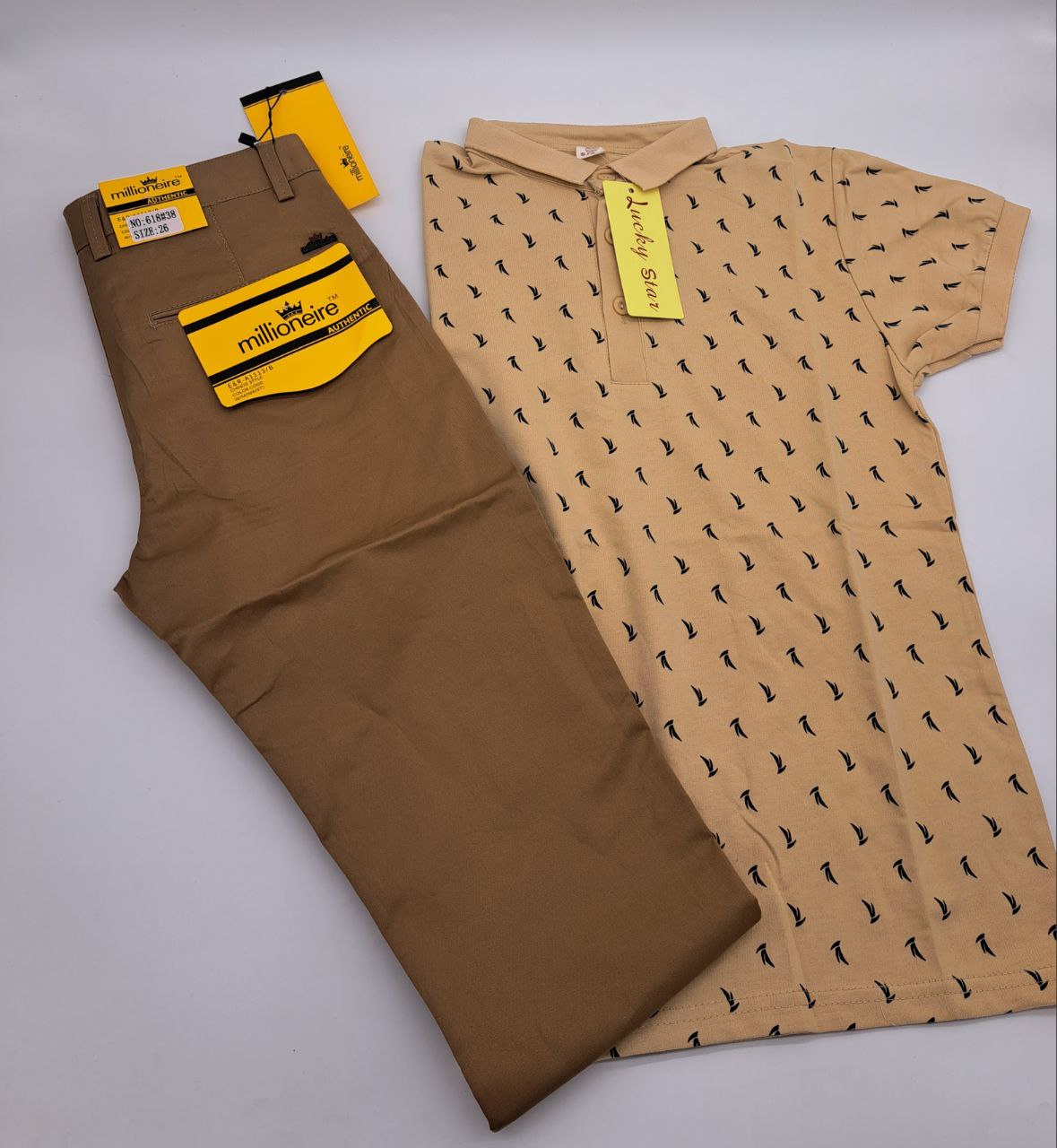 a bed with a pillow and a bag on it 