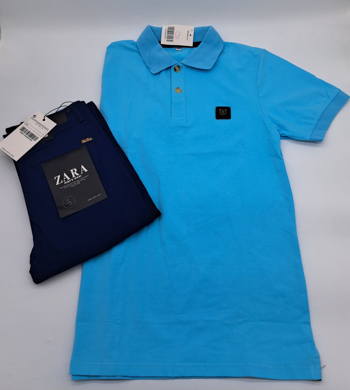 a blue suitcase sitting on a white surface 