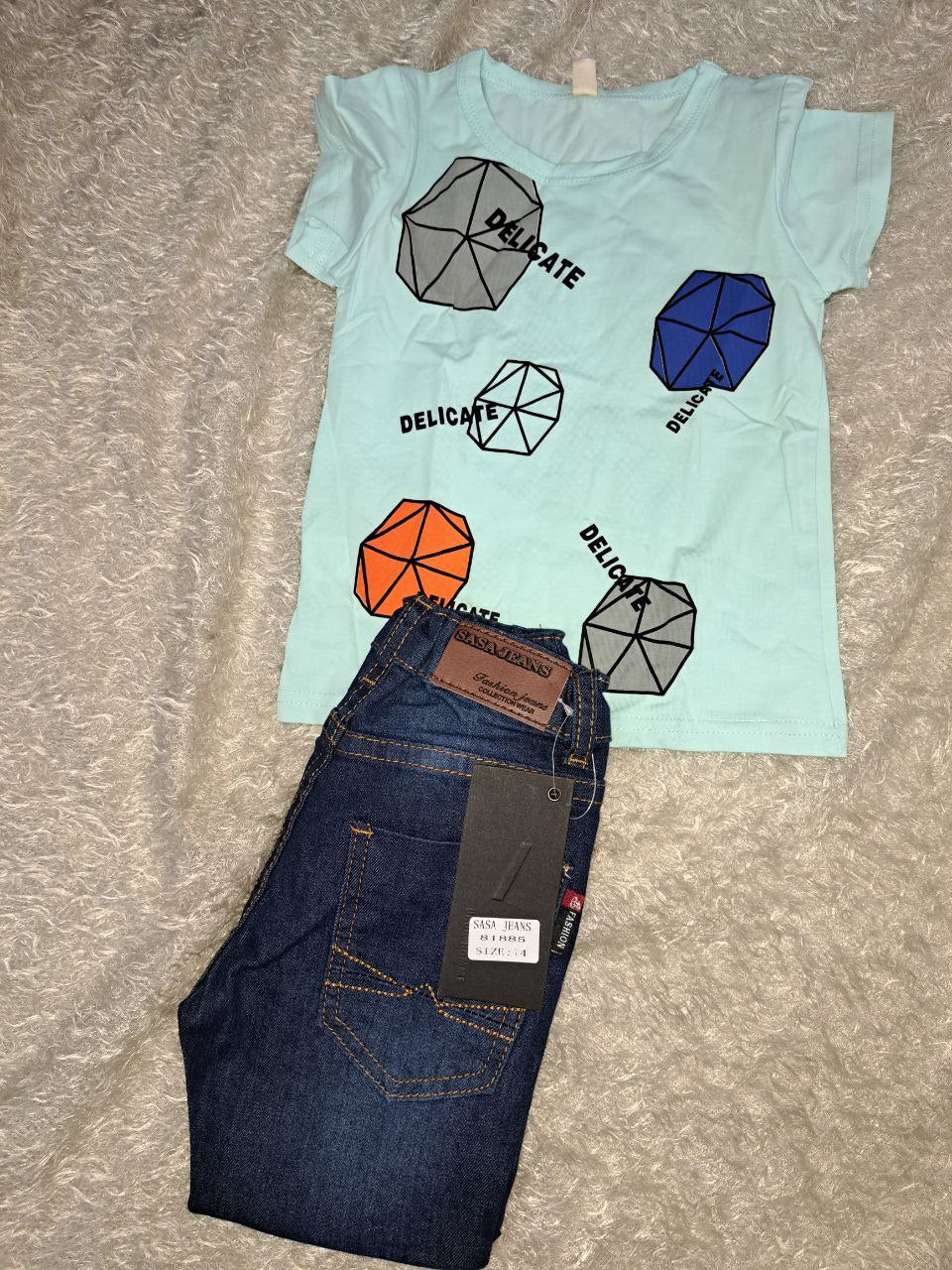 a cell phone sitting on top of a towel 