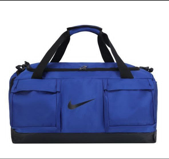 a close up of a blue suitcase on a blue surface 