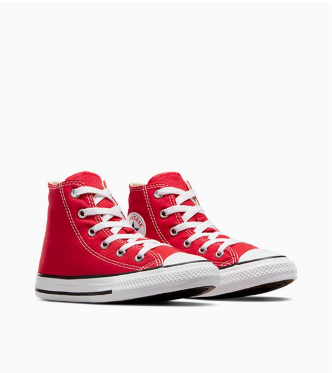 a pair of red shoes on a white sneaker 