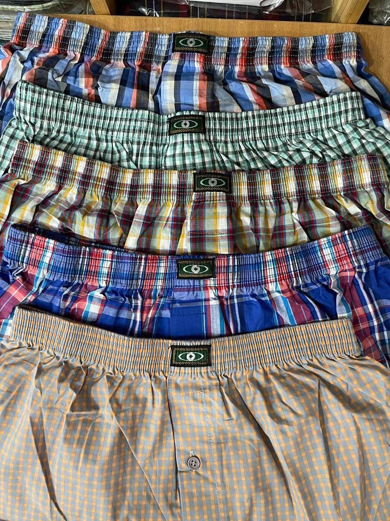 a bed with a blanket on top of it 