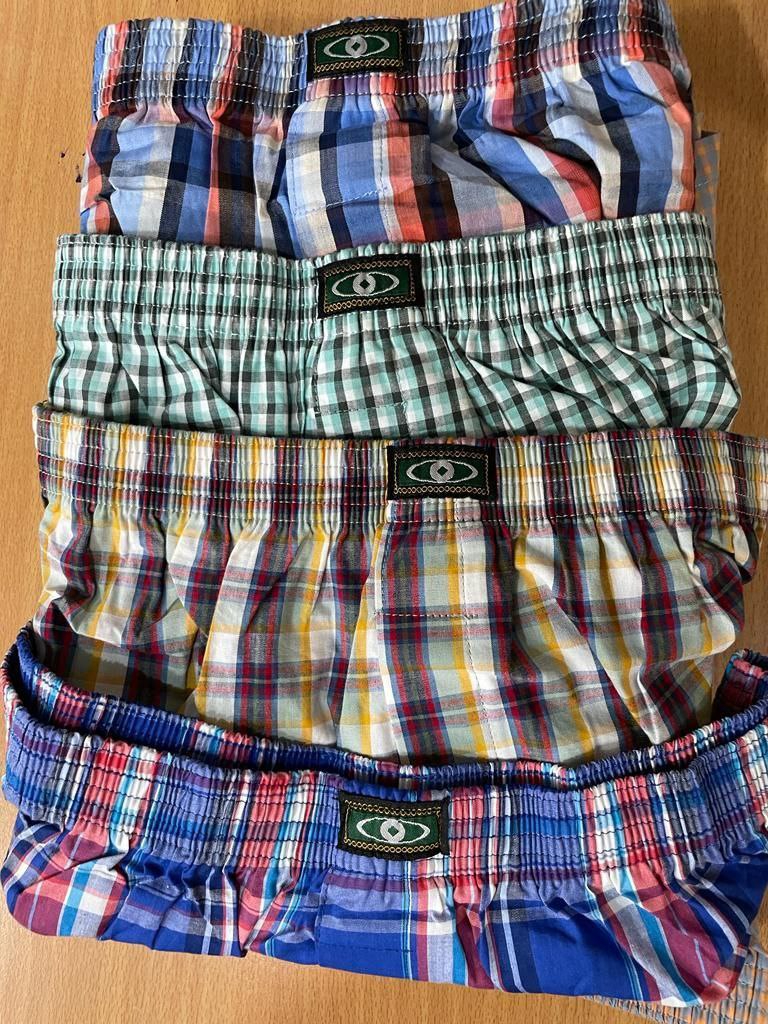 a bag of luggage sitting on top of a wooden floor 