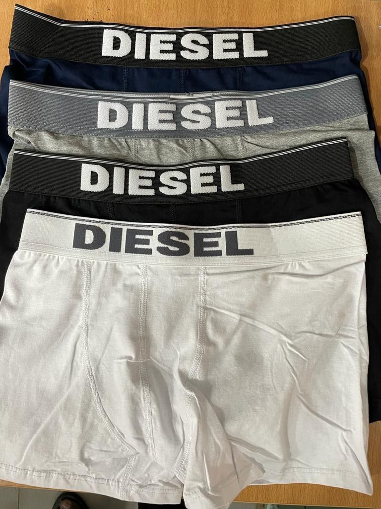 a pile of luggage sitting on top of a table 